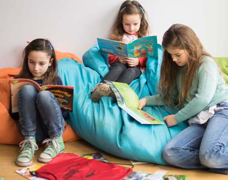 three children reading
